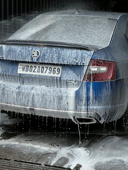 a car is covered in ice and water