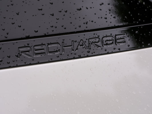 The word recharge is visible on the vehicle.