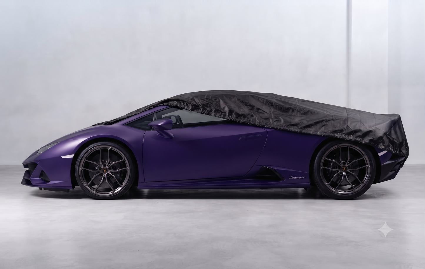 Deutschmotor Lamborghini Aventador 2011-2022 outdoor waterproof car cover protecting the bright yellow supercar from rain and weather.
